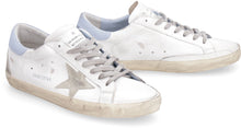 Load image into Gallery viewer, Superstar leather low-top sneakers
